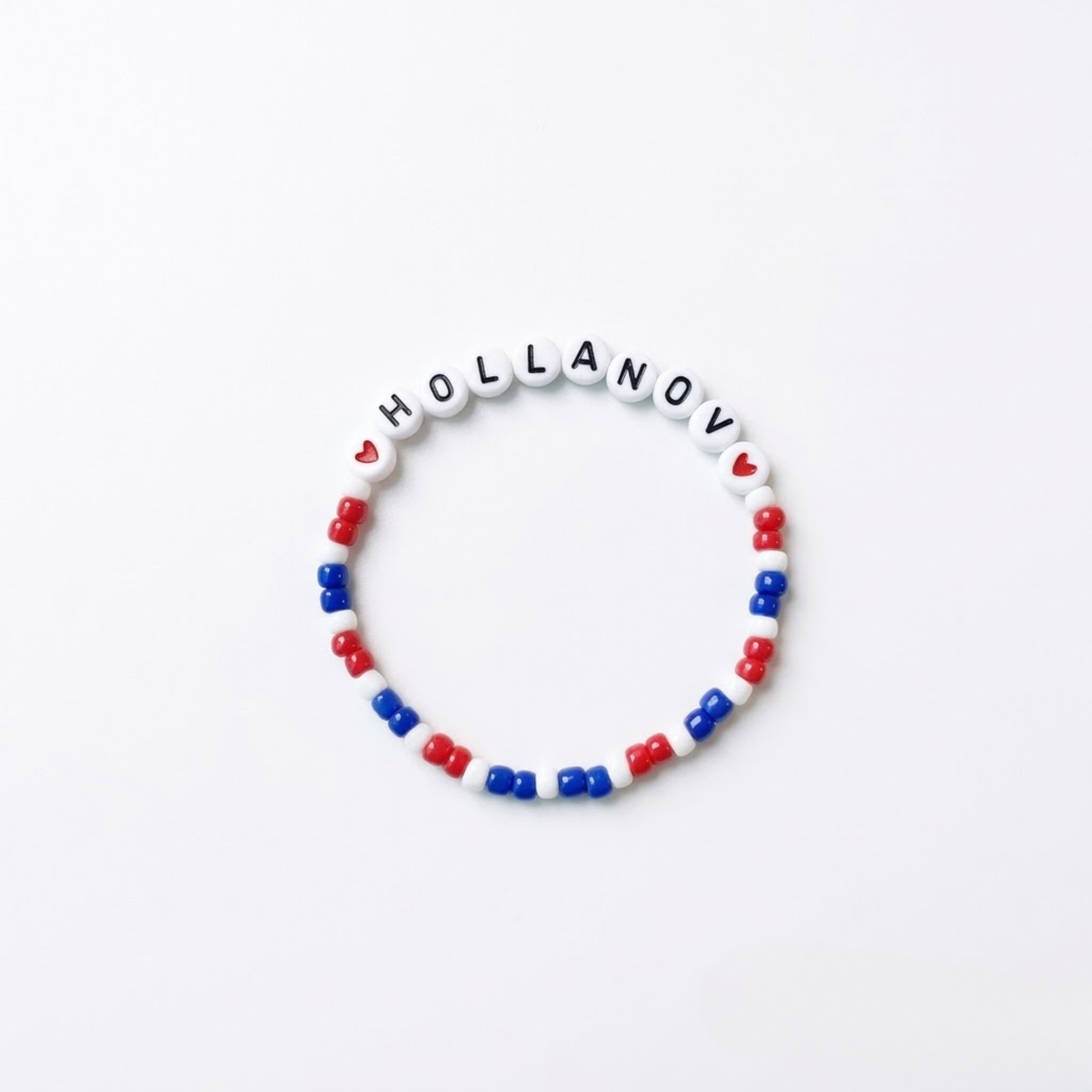 Heated Rivalry "HOLLANOV" Handmade Beaded Friendship Bracelet flat lay product shot – Lizzie & Friends