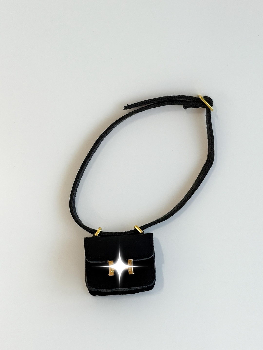 Labubu Mini Black Crossbody Bag – Gold Accent Edition