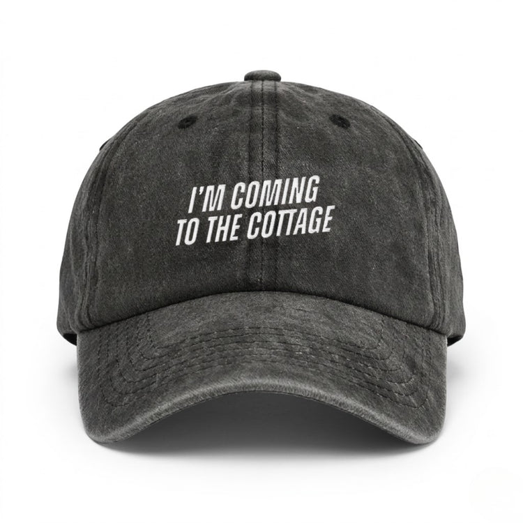 Heated Rivalry "I'm Coming To The Cottage" Vintage Washed Dad Hat flat lay product shot – Lizzie & Friends