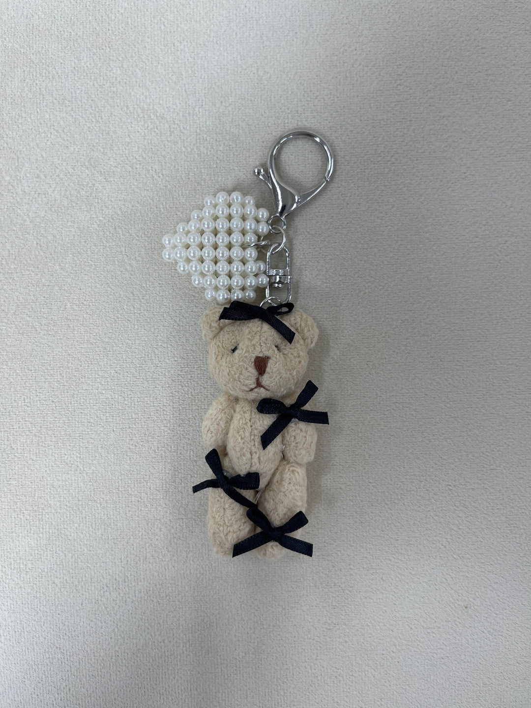 Pearly Teddy Bag Charm with Bow Tie