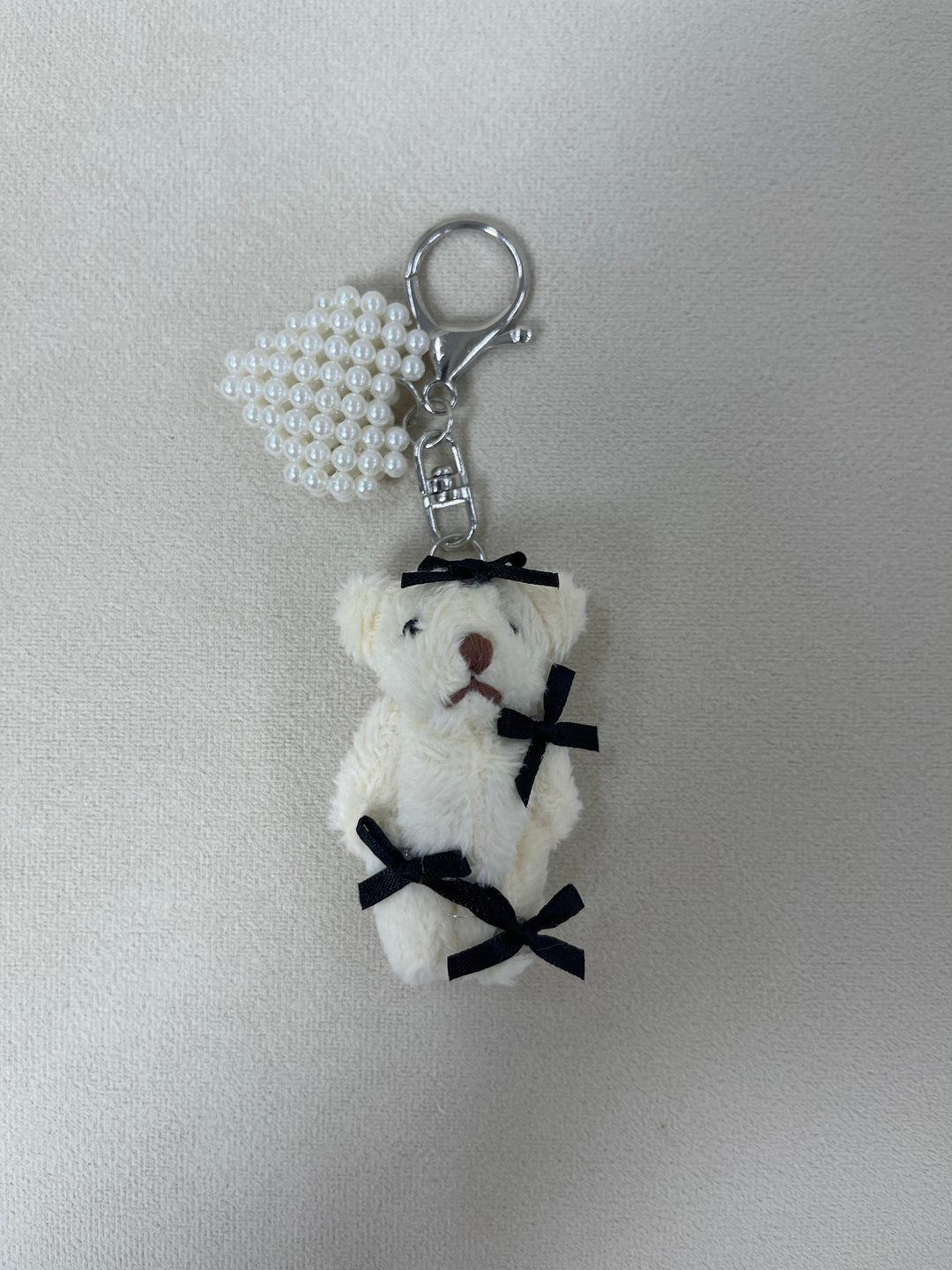 Pearly Teddy Bag Charm with Bow Tie